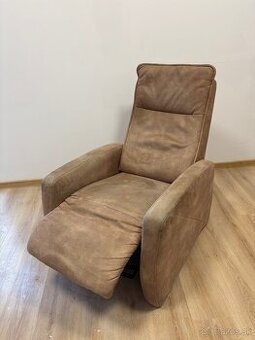 Polohovateľné kreslo