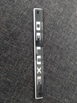 Znak DELUXE