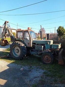 Traktor bager Bielorus