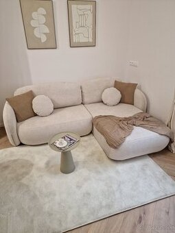 Rohová rozkladacia sedačka Olio - krémová