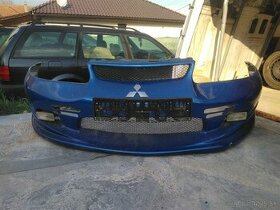 Tuningový laminátový nárazník Mitsubishi Carisma 1995-1999 - 1