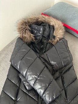 Damska cierna zimna presivana bunda