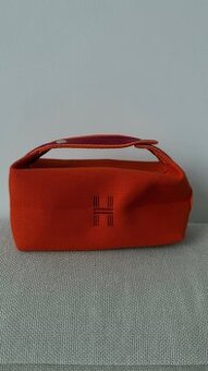 Oranžova kozmetička taška Hermés