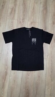 Amiri Paint Drip logo