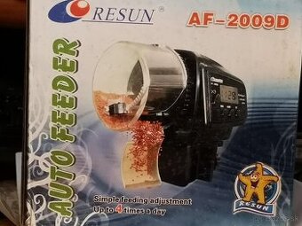 Predám automatické krmítko pre akváriové rybičky AF 2009 D .