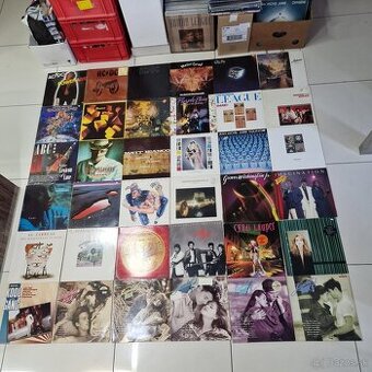 LP-čky...AC/DC,MOTORHEAD,CHRIS REA,EUROPE,GENESIS,PRINCE,