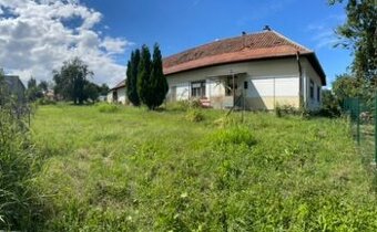 Pozemok na predaj Sľažany