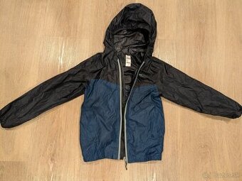 Nepremokavá skladacia bunda Quechua, veľ.8-9 rokov