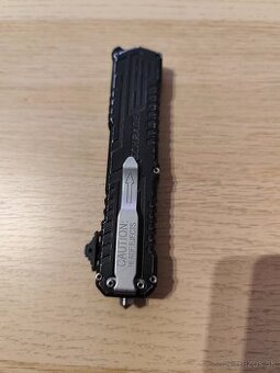 SCHRADE Zatvárací nôž Viper 3rd Gen OTF Assist - šedý (SCHOT