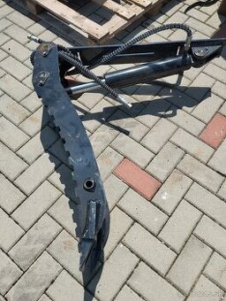 hydraulicky pridržiavaci palec