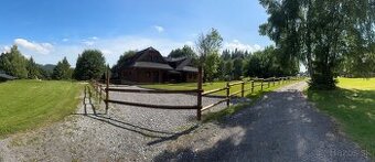 Zabehnutá rekreačná drevenica