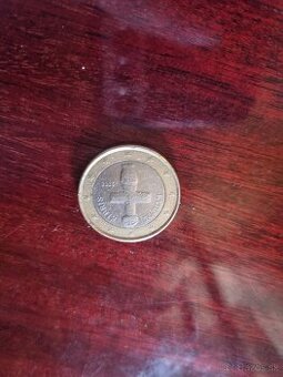1 eurova minca s krížikom