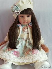 Realistická bábika s cumlikom, oblečenie Ladové královstvo
