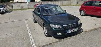 Mazda 323 NOVÁ STK EM