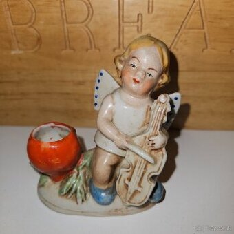 Porcelánová soška cena 12€ /v-8cm,d-7cm/