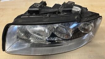 Ľavý reflektor Audi Avant A4
