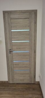 Predám použite dvere ERKADO Šírka: 70– Daglezja s obložkami.