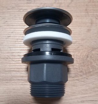 Umývadlová výpusť click-clack