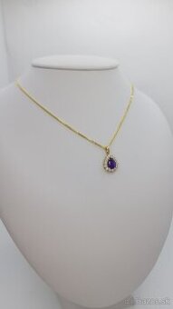 Zlatý náhrdelník s fialovym kamenom