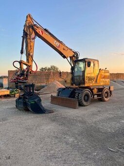 CAT M314 s rotačnou hlavou Rototilt