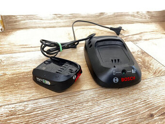 Akumulátor Bosch 14,4V 1,5Ah Li-Ion + a nabíjačka AL2215CV