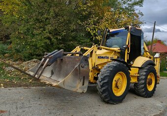 Traktorbager Komatsu s TP a ŠPZ