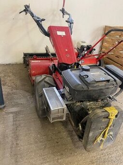 Malotraktor so spätnou frézou - zakladač trávnika