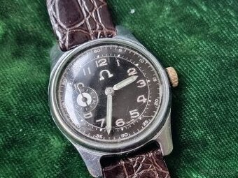 Náramkové hodinky.