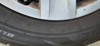 Plechové kol. s pneu zn. BRIDGESTONE BLIZZAK 205/60 R16 92H