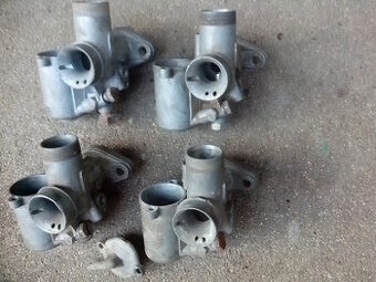 Karburátory a brzdový štít Manet Tatran