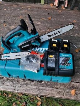 Aku řetězová pila Makita DUC122Z +2x baterie a další