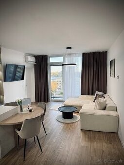 Nový,neobývaný a luxusne zariadeny 2 izbovy byt.