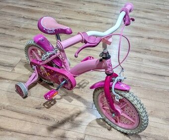 Dievčenský detský bicykel s pomocnými kolieskami