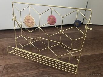 Dizajnový stojan na knihy v zlatej farbe