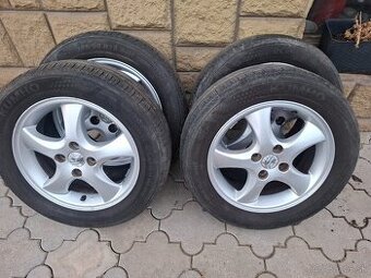 Suzuki Ignis 1,3  185/60 r15