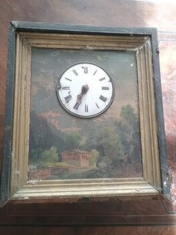 Hodiny v obraze a fotka kňaza