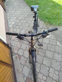 Starší bicykel PIRANHA