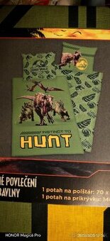 Nové obliečky s dinosaurami.
