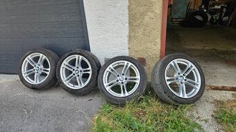 BMW  245/45 R18
