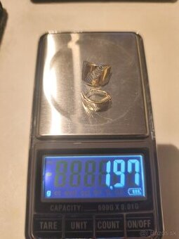 Zlaté náušnice+strieborná retiazka.