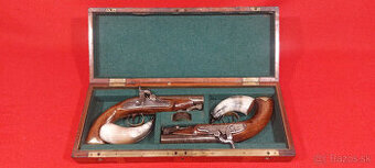 KAZETA S PERKUSNÝMI PIŠTOLAMI