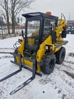 UNC 060 - Smykový nakladač - Brno