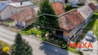 Slnečný pozemok s domom v obci Čereňany