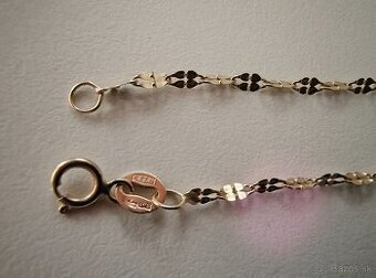 NOVÁ  ZLATÁ  RETIAZKA