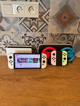 Nintendo switch OLED + joycony + puzdro