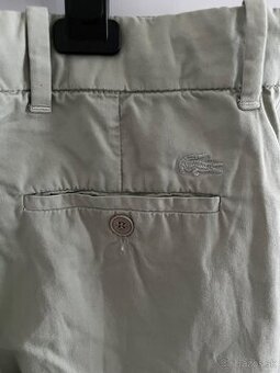 Damske nohavice Lacoste. Velkost 38.