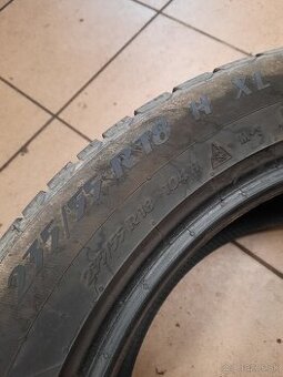 235/55R18 - 1