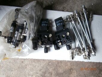 Pneumatické ventily na 115V,piesty,trubky.