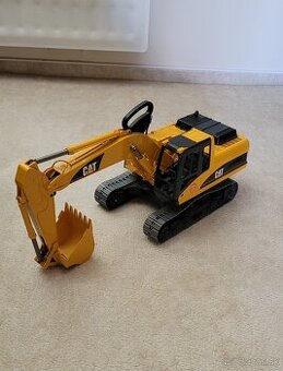 Bruder pasovy bager CAT Caterpillar