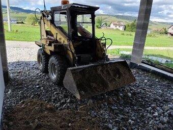 Unc smykovy nakladac.